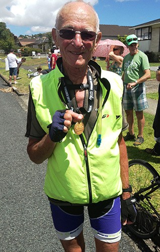 Ray Hyndman with his finishers medal.